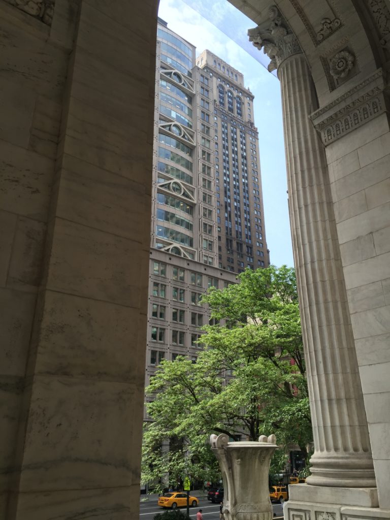 The former Chase Tower at 10 East 40th Street, through an arch of the New York Public Library.