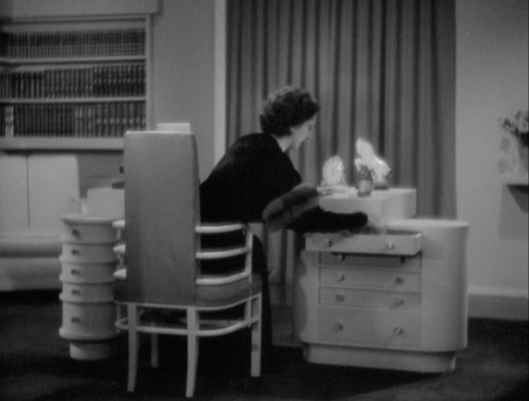 K.E.M. chair in the 1932 film Trouble in Paradise.