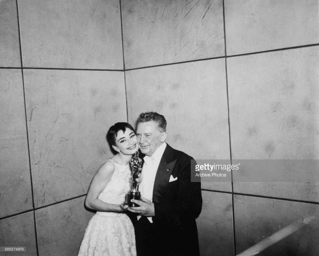 Jean Hersholt and Audrey Hepburn in the basement of the Center Theatre.