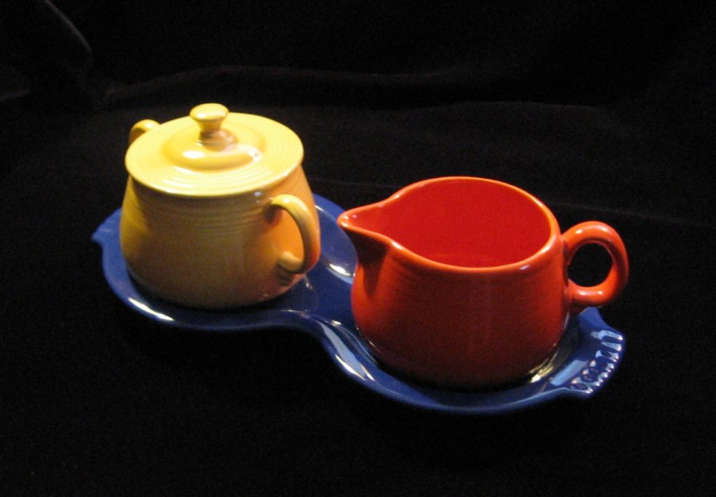 Fiestaware 1940 promotional campaign: the sugar cream and kitchen stets.